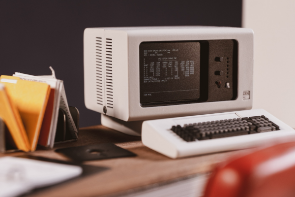 A miniature 1:12 scale model of a computer terminal, on a desk. 